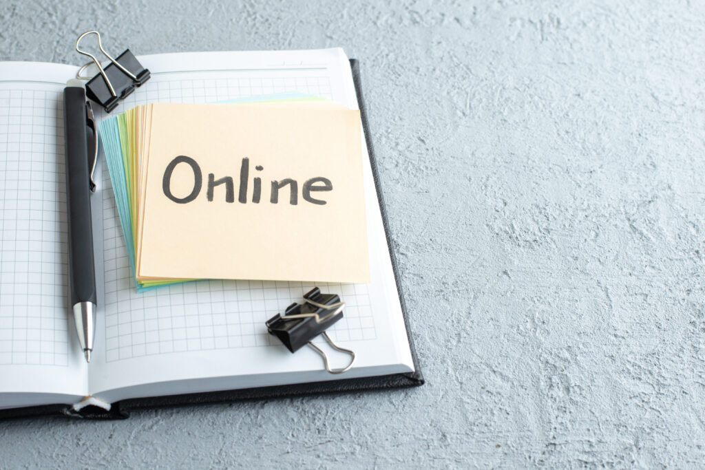 front view online written note with pen notepad white background