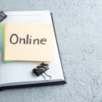front view online written note with pen notepad white background